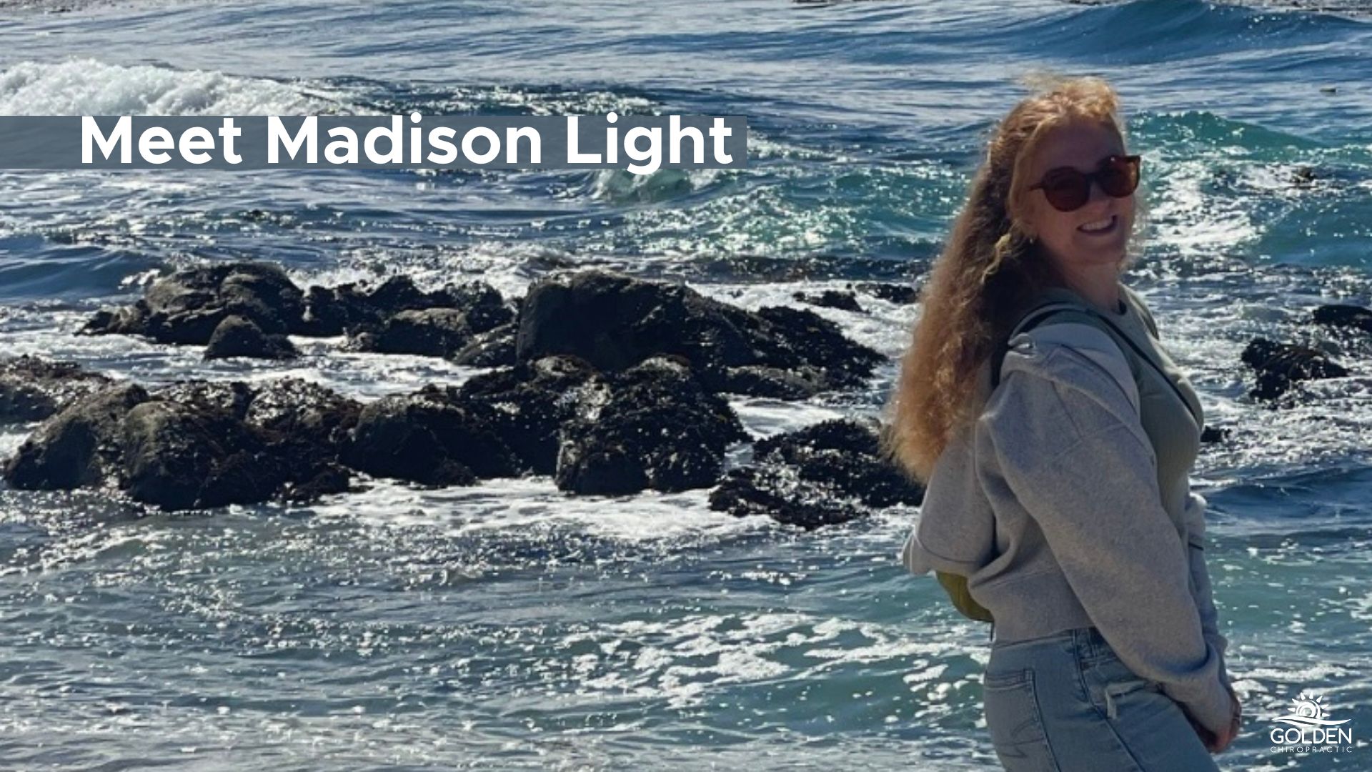 Madison Light Standing in front of the ocean