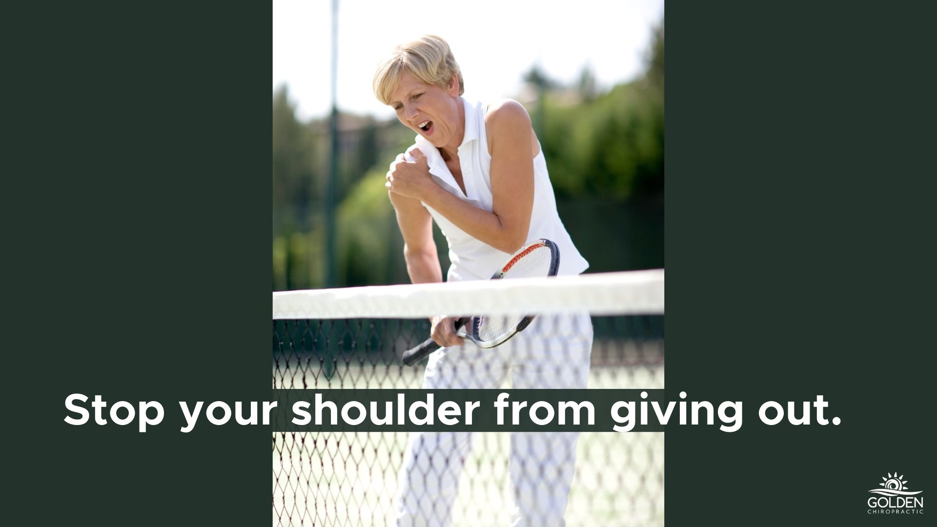 older woman on tennis court clutching her shoulder